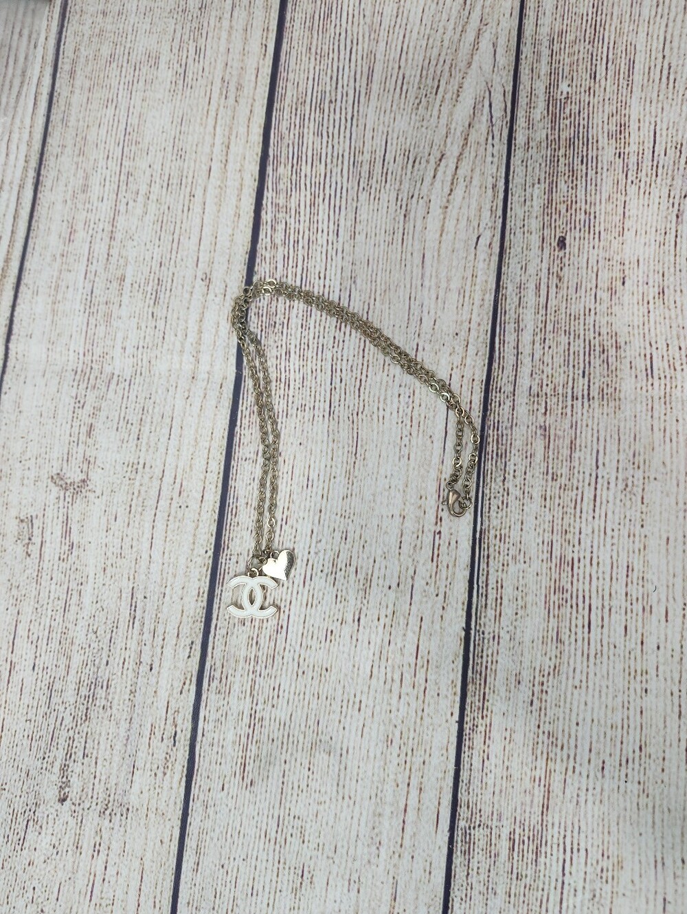 CHANEL Gold-Tone Double C Pendant Necklace with Heart Charm